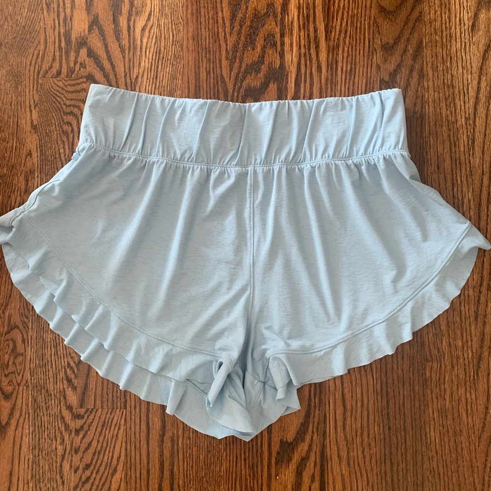 Free People featherweight layering shorts. Color “Teal grey”. Size medium. New.